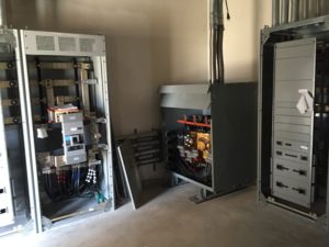 Commercial electrical room with switchgear and transformer