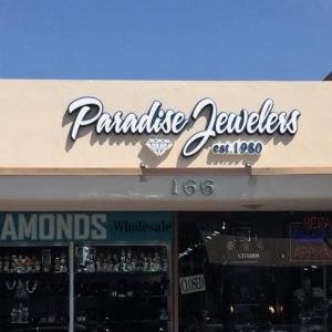Paradise Jewelers storefront with channel-letter sign lighting