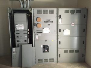 Main service switchgear labeled 9979 Valley Blvd